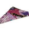 Scarf folded into a triangle showing the print