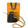 Bag shown with its Louis Vuitton gift bag