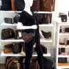 Heart bag worn crossbody on a mannequin in the boutique