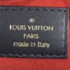Louis Vuitton Paris made in Italy patch on the red lining
