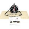 Bag shown with its dust bag and authenticity certificate