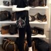 Boite Chapeau worn crossbody by a mannequin in the boutique