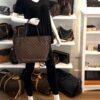 Neverfull MM carried by a mannequin in the boutique
