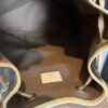 Interior lining with the Louis Vuitton tab at the base