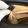 GUCCI label stitched into the tan interior lining
