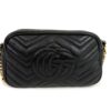 Front view of the chevron quilted body and gold double G