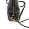 Top view showing the zip pull and the gold strap rings