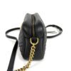 End view with the strap and chain hanging to one side