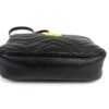 Low side view showing the flat base and clean leather