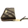 Three quarter view of the closed wallet and nameplate
