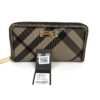 Wallet with the Burberry retail tags attached
