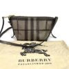 Bag shown with its Burberry drawstring dust bag