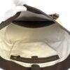 Interior open showing the zip pocket and lining
