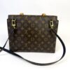 Back of the bag with the shoulder strap attached