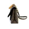 Opposite side with the strap hanging
