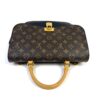 Top of the bag showing the vachetta handle