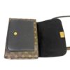 Bag open showing the black interior and flap