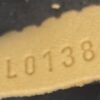 Date code FL0138 stamped on the leather tab