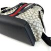 Base corner showing the navy leather panel and web
