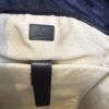 Gucci label stitched inside the cream canvas lining