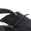 Close up of the strap anchor and the padded back panel