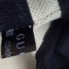 Close up of the GUCCI care tag sewn into the lining