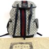 Backpack shown with its Gucci dust bag