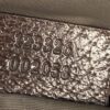 Serial numbers 123326 and 002058 embossed inside