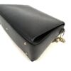 Base corner showing the metal feet and stitching