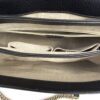 Interior lining and chain strap seen from above