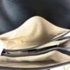 Interior beige lining and the zip compartment
