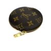 Angled view with the gold zip pull hanging down