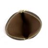 Purse unzipped showing the brown leather interior