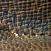 Faint date code stamped inside the coin purse