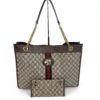 Gucci Rajah large chain tote in GG Supreme canvas with green red web and enamel tiger head, shown with its matching zip pouch