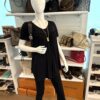 Full length view of the necklace worn on a mannequin