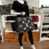 Onthego GM carried by a mannequin in the boutique