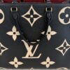 Front panel showing the giant monogram and handles
