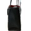 Narrow side view showing the depth of the tote