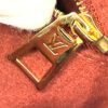 Gold zip pull embossed LV inside the tote