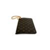 Pouch standing at an angle on the monogram canvas