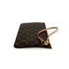 Angled view of the pouch and its wristlet