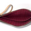 Pouch open showing the Pivoine striped lining