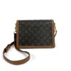 Bag shown with the leather strap and monogram flap