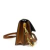 Top of the bag showing the gold LV clasp