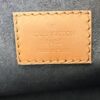 Leather tag reading LOUIS VUITTON PARIS made in Spain