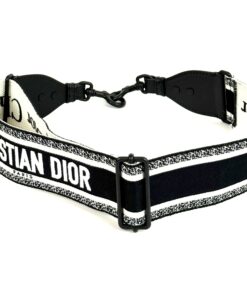 Strap coiled to show the CHRISTIAN DIOR embroidered lettering