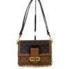 Front of the bag with the strap standing above