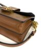 Angled front with the leather strap attached