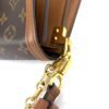 Detail where the chain meets the leather strap